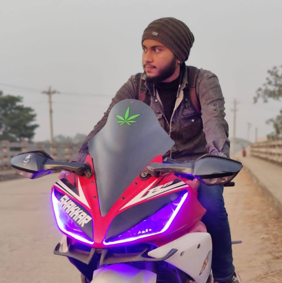 Umashanker Gupta Chwdhury photographed on January 12, 2023 while riding a motorcycle.